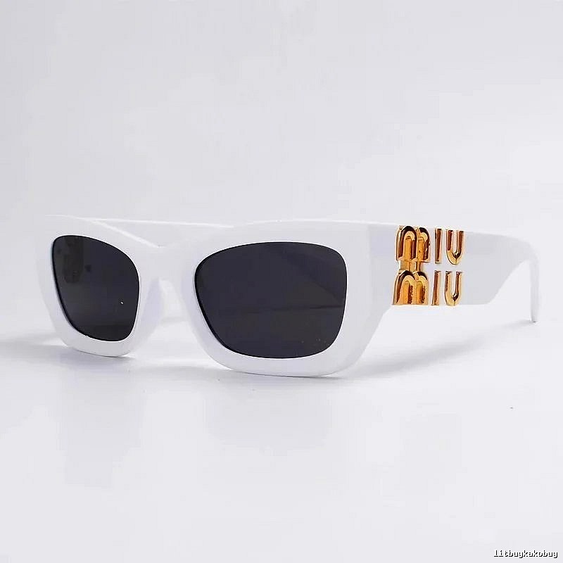Miu Miu Monogram Oversized sunglasses Black Oval Sunglasses for Layered Styling